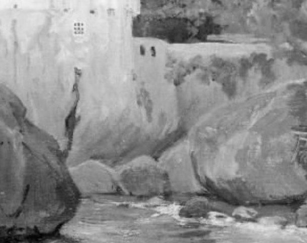 The textured, weathered rocks form the foundation of the scene, showing the raw power of nature.