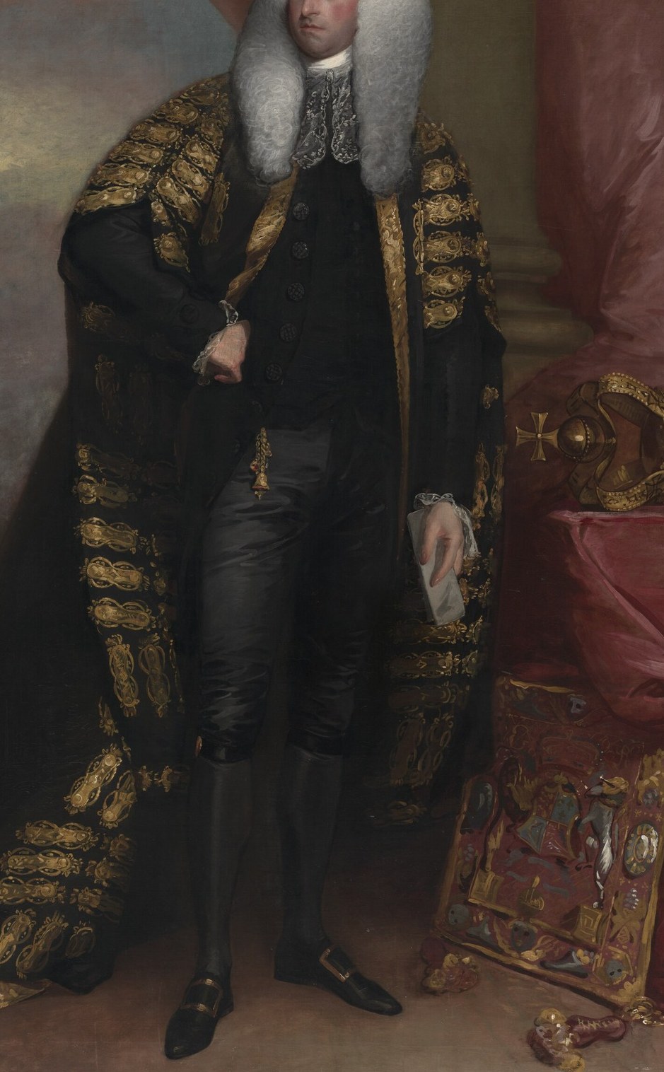 His gold-embroidered robe seems real.