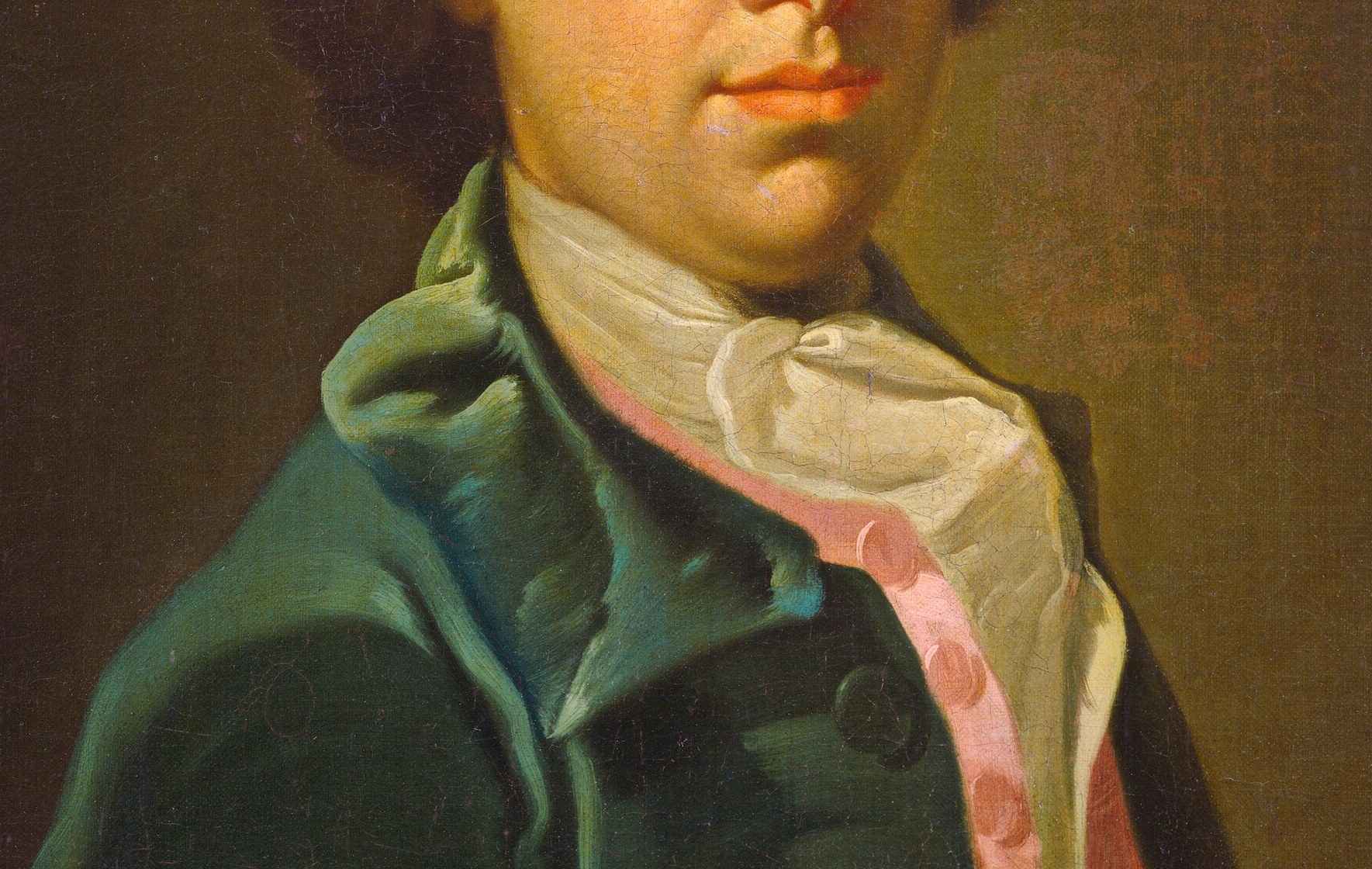 A chain of honor , likely a collar of a chivalric order , its mass and weight rendered with Mor's characteristic metallic precision, the single loudest status signifier in the image.