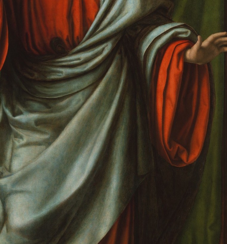 His blue robe suggests an ethereal, divine nature.