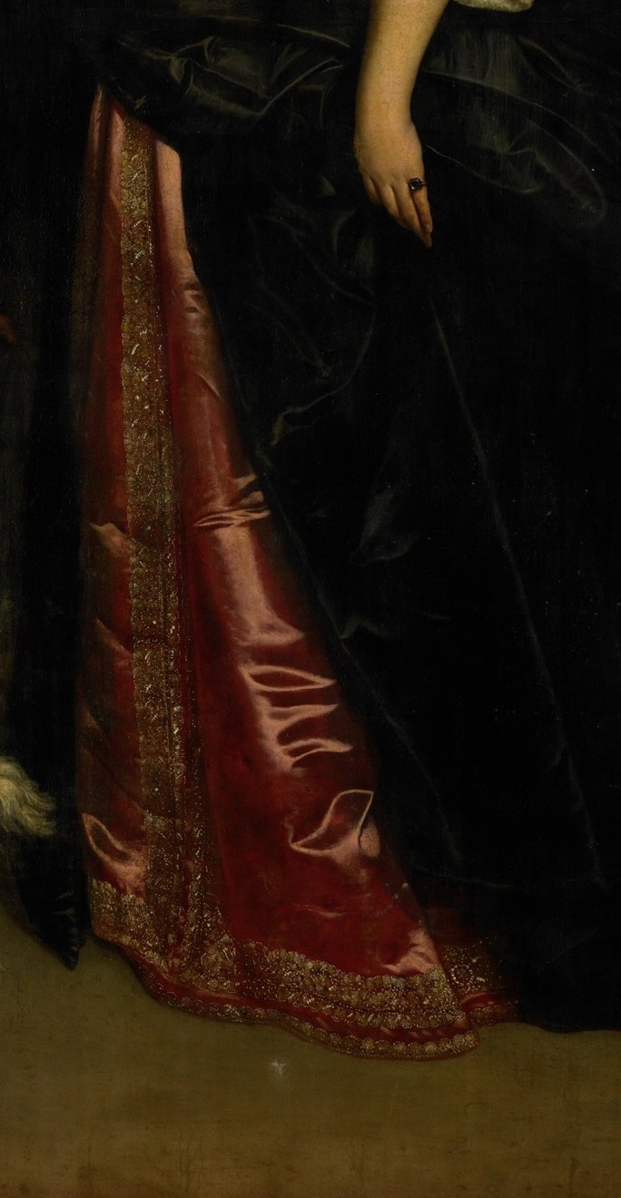 Underneath, silk and gold embroidery.