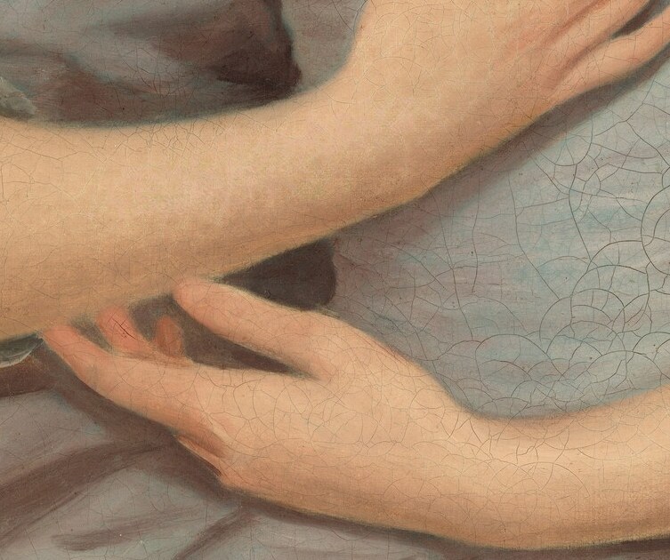 But her clasped hands hold a hidden meaning.