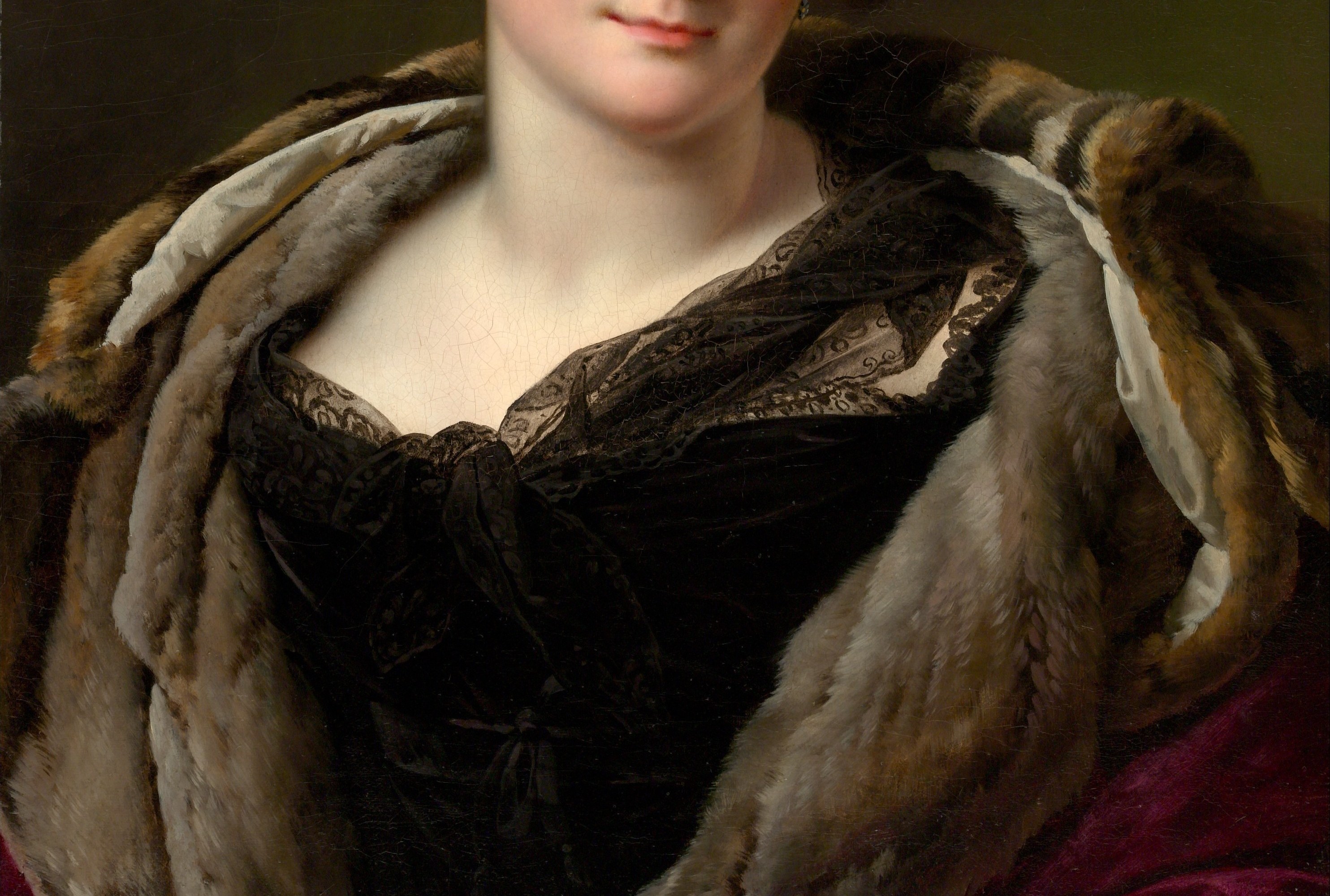 The luxurious fur wrap declared her family's wealth and status.
