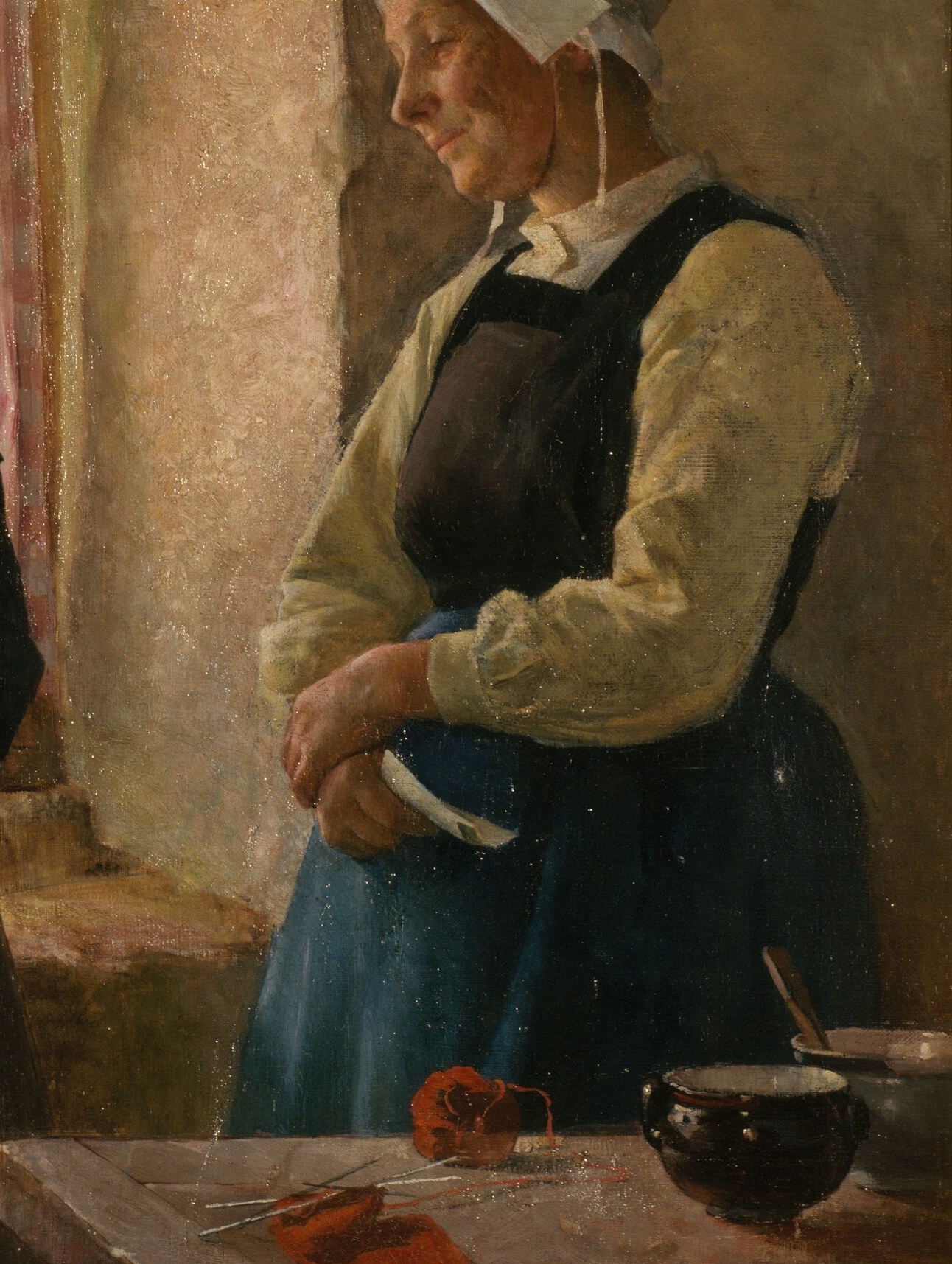 Her companion waits, perhaps for news, or to share.