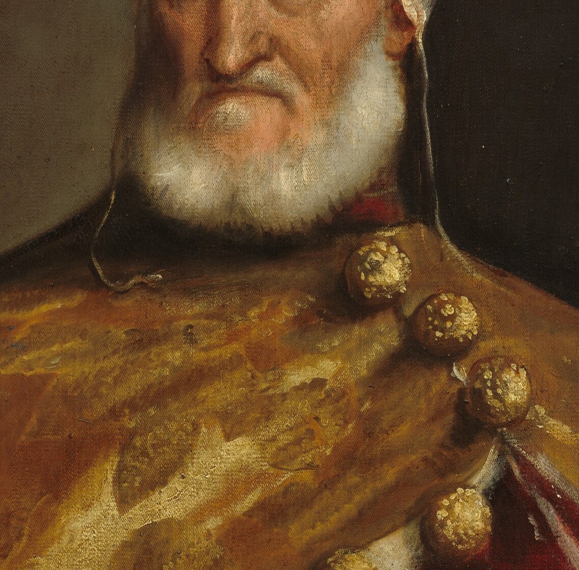 The beard is painted with extraordinary bravura , individual strands catch light against the dark crimson robe, showing Titian's virtuoso dry-brush technique.