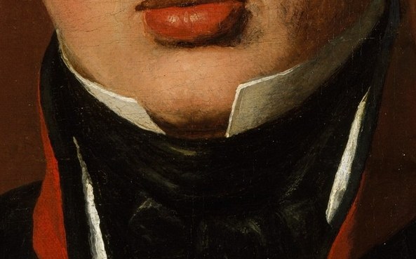 The crisp white collar contrasts with the dark uniform, highlighting the sitter's face.
