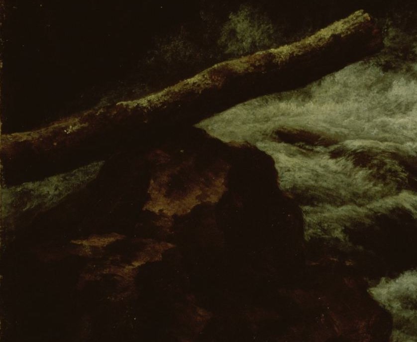 A mossy log is being worn away here.