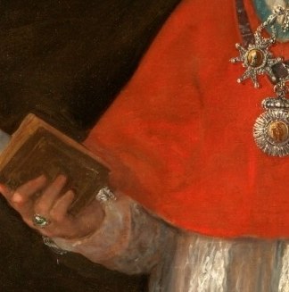 The open book emphasizes his role as a man of the church.