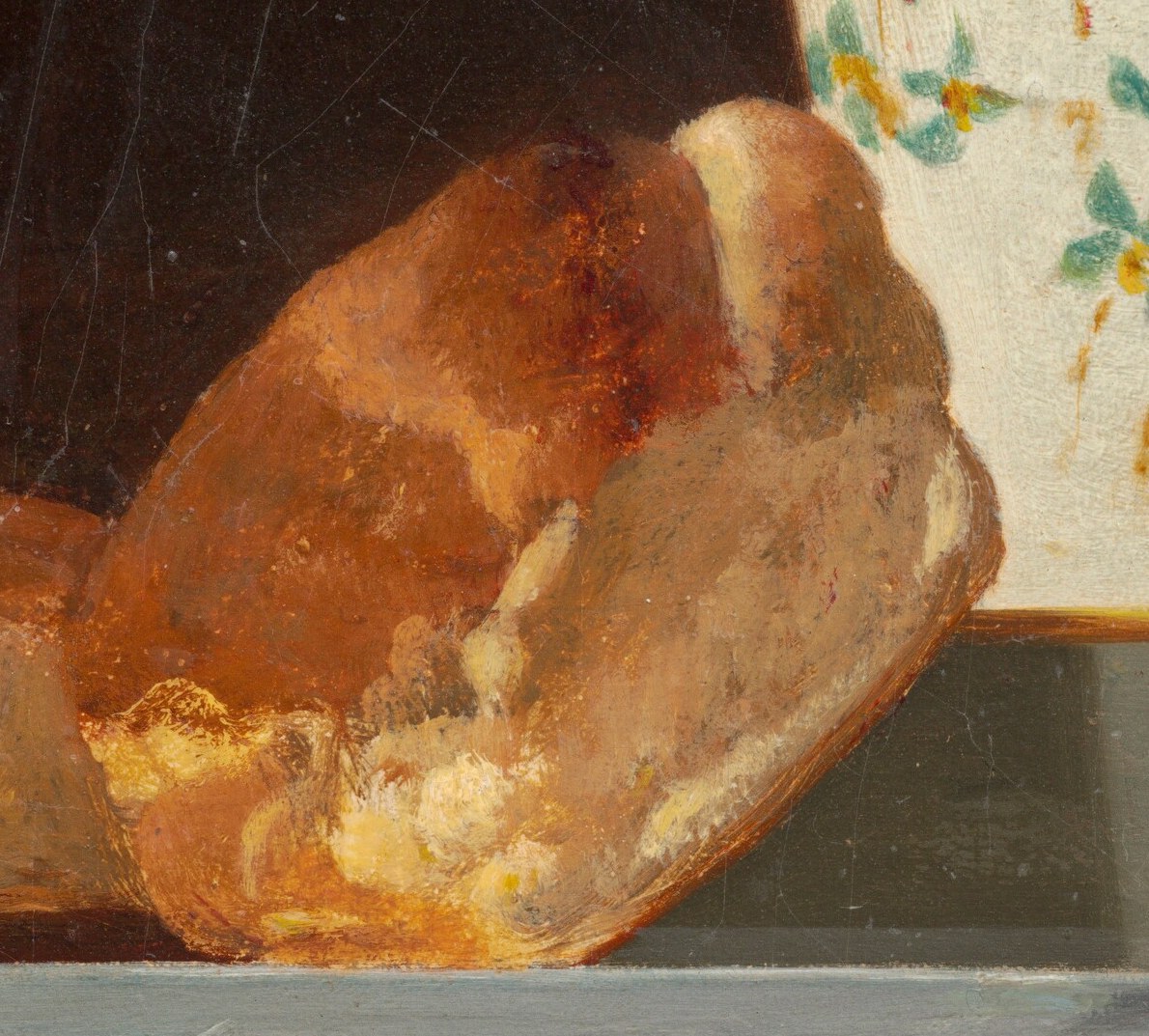 This loaf appears torn open, revealing a soft, airy interior, hinting at a recent meal.