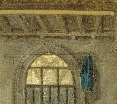Light streams from a large arched window.