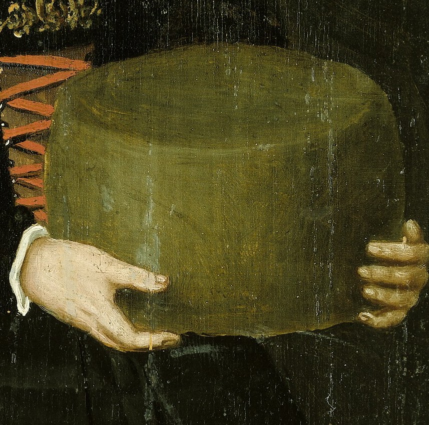 The green sphere: a pomander, a ball of perfume.