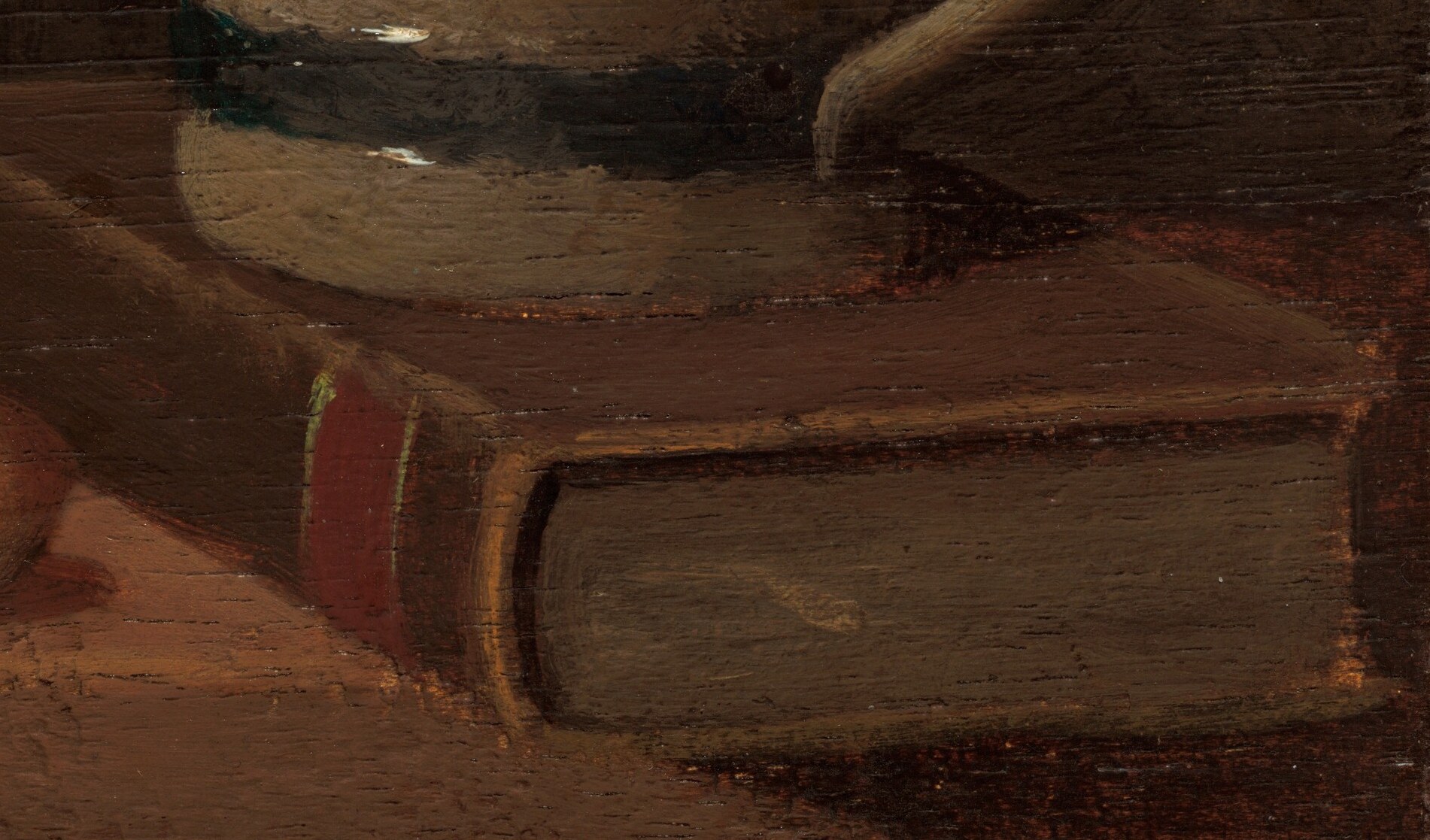 Its presence suggests intellectual pursuit or quiet study, complementing the domestic setting.