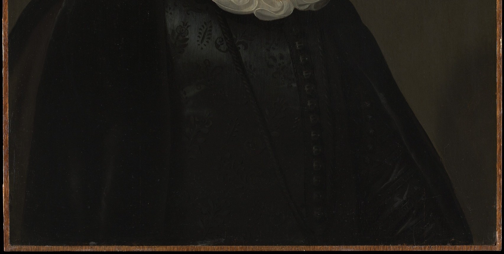 The unadorned black coat was a badge of Calvinist wealth.