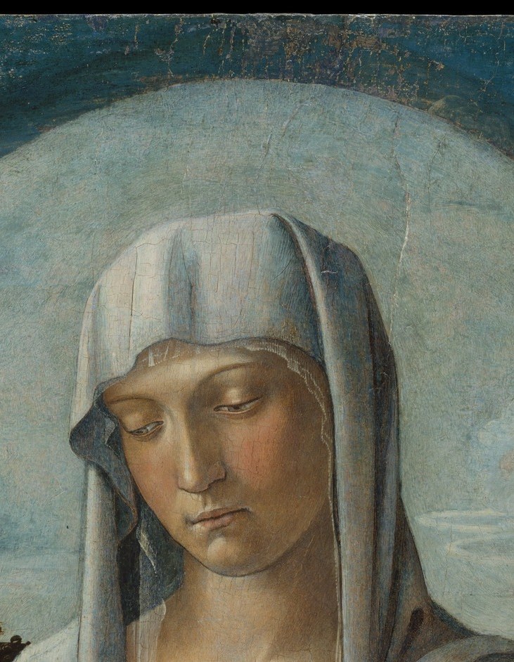 The white veil is tempera. Look at the shadows in the folds.