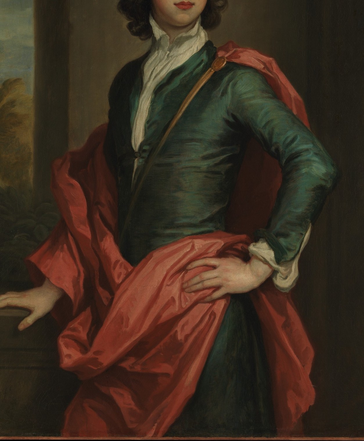 The dramatic red cloak adds a theatrical element.