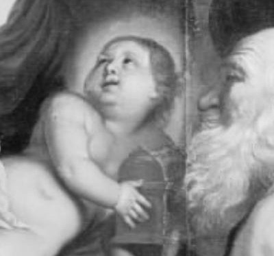 The child looks up with divine awareness.