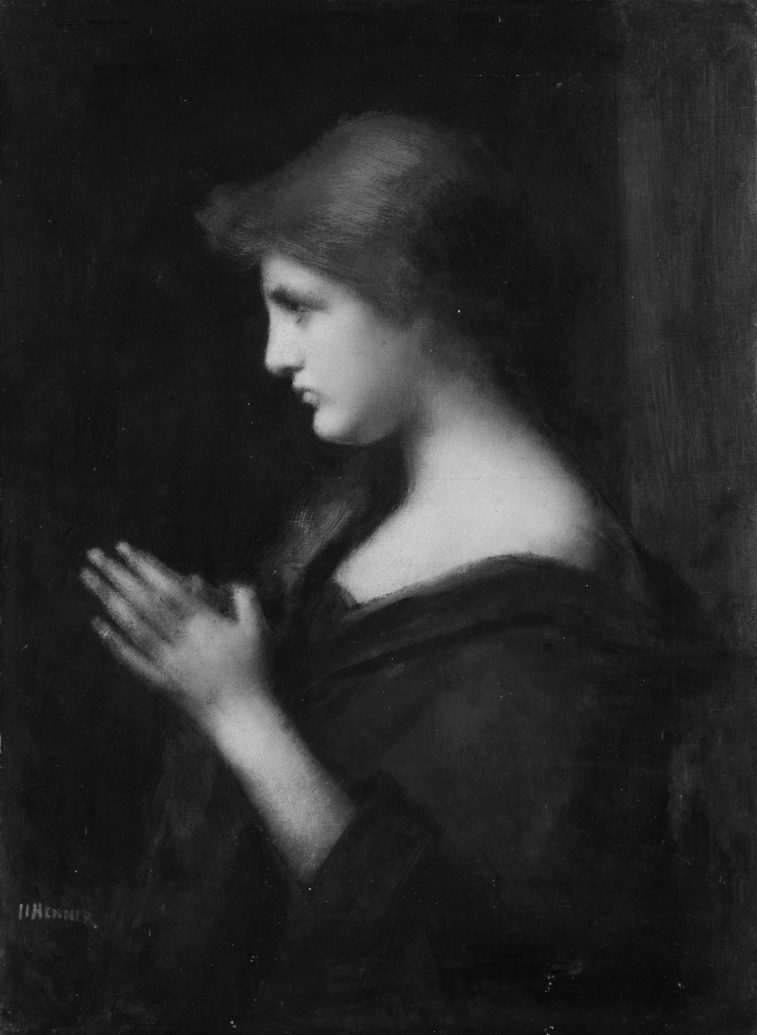 It highlights her solitary focus against the dark background.