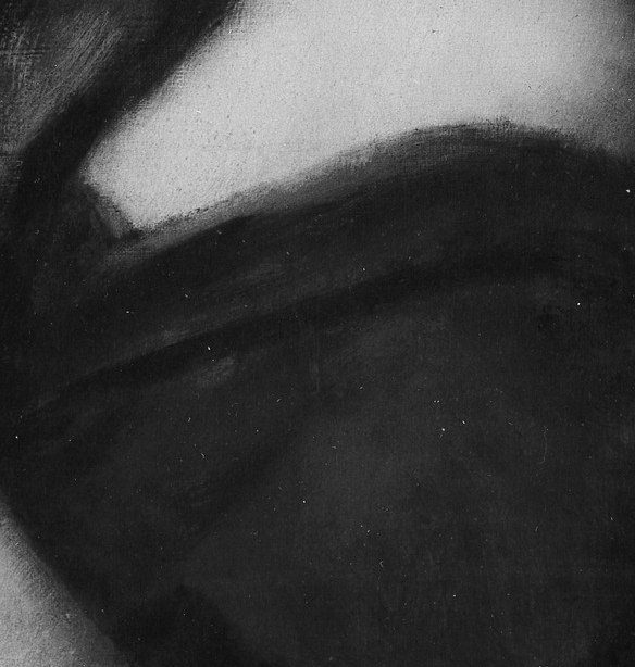 Her clasped hands are illuminated, drawing our eye.
