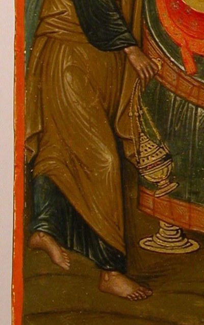 At the lower left: a man in red, crouching.
