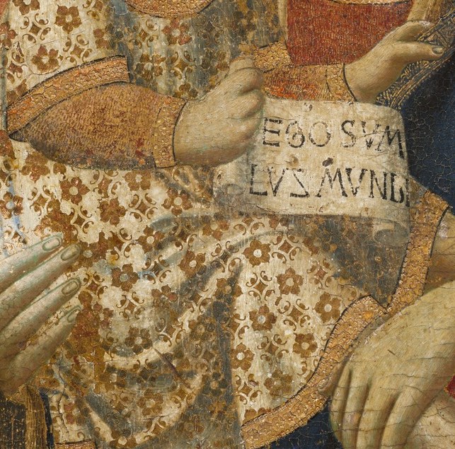 Her hands: a theologian wrote that she presents the child, she does not clutch him.