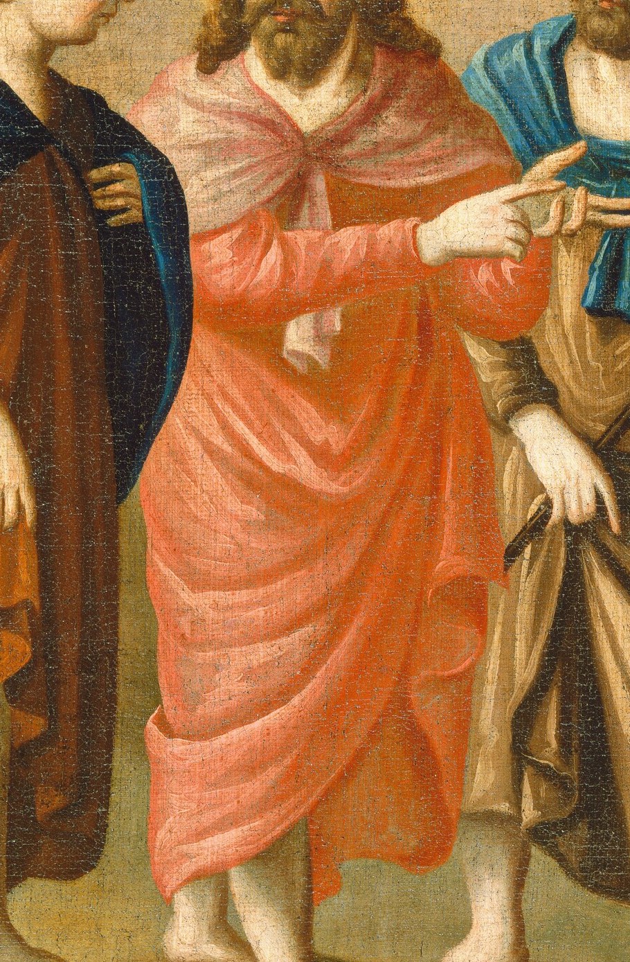 Christ, in his bright pink robe, explains the scriptures.