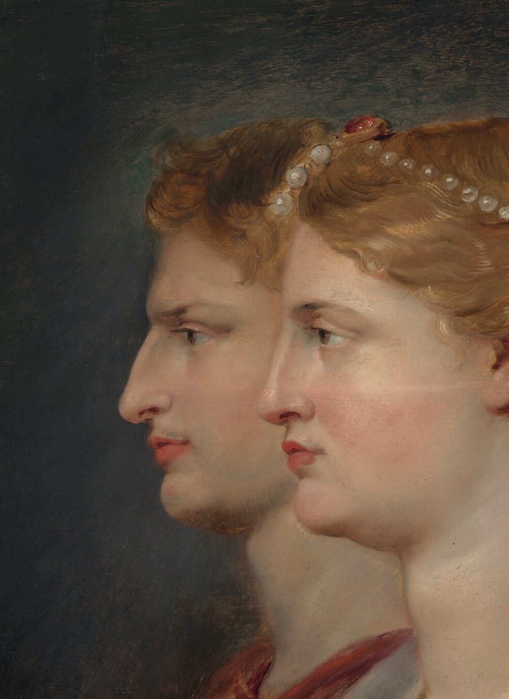 His warmer, slightly darker flesh tone against her ivory skin is Rubens's deliberate technique for differentiating gender , comparing their cheeks side by side reveals the contrast instantly.