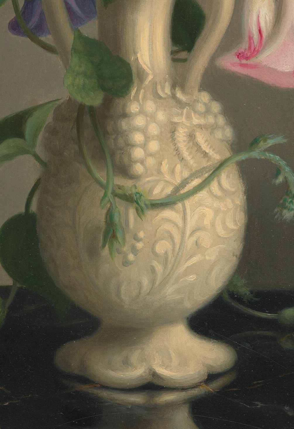 The flowers are arranged in an ornate folk-art vase.