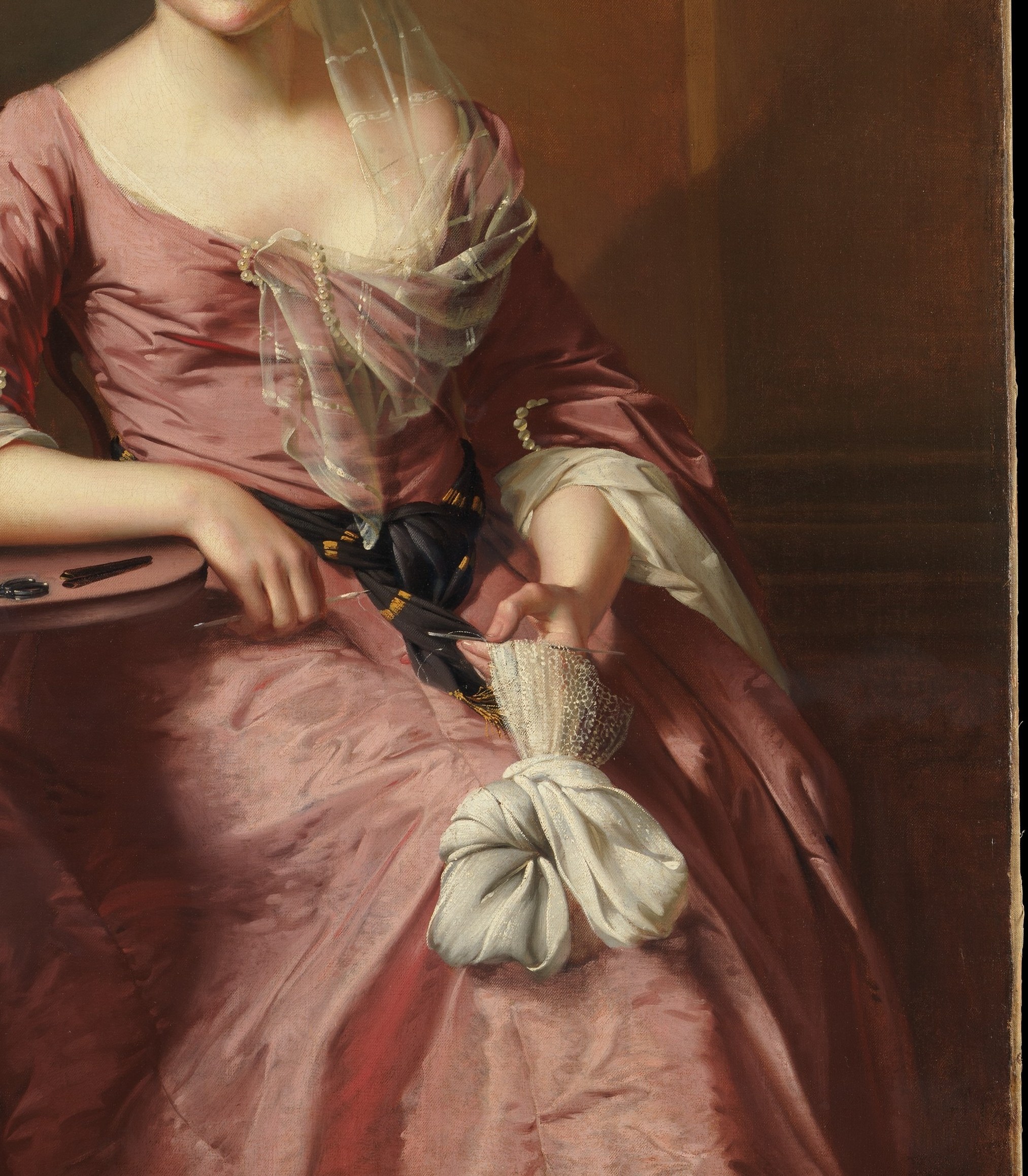 Pink silk, a black sash.