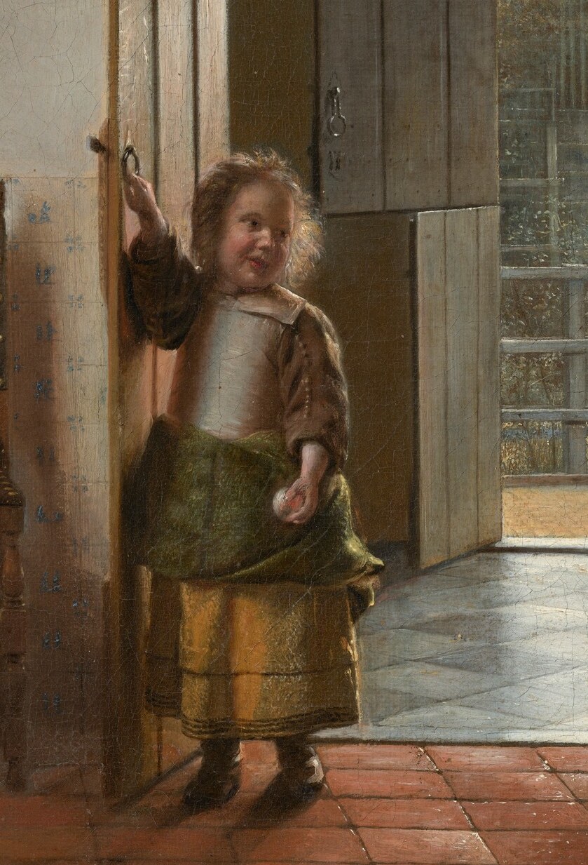 Through the doorway, a child plays, gazing at the viewer.
