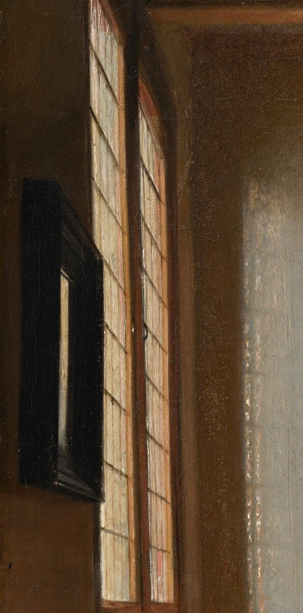 Sunlight streams in, highlighting the textures of her home.