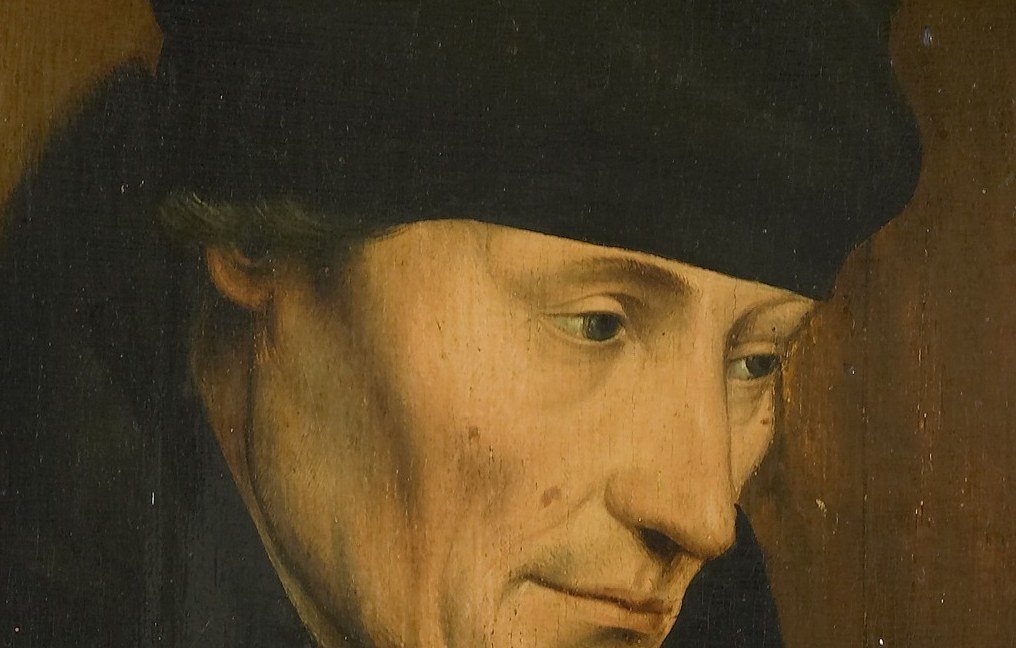 The simple, dark hat frames his face and suggests his clerical or scholarly status.