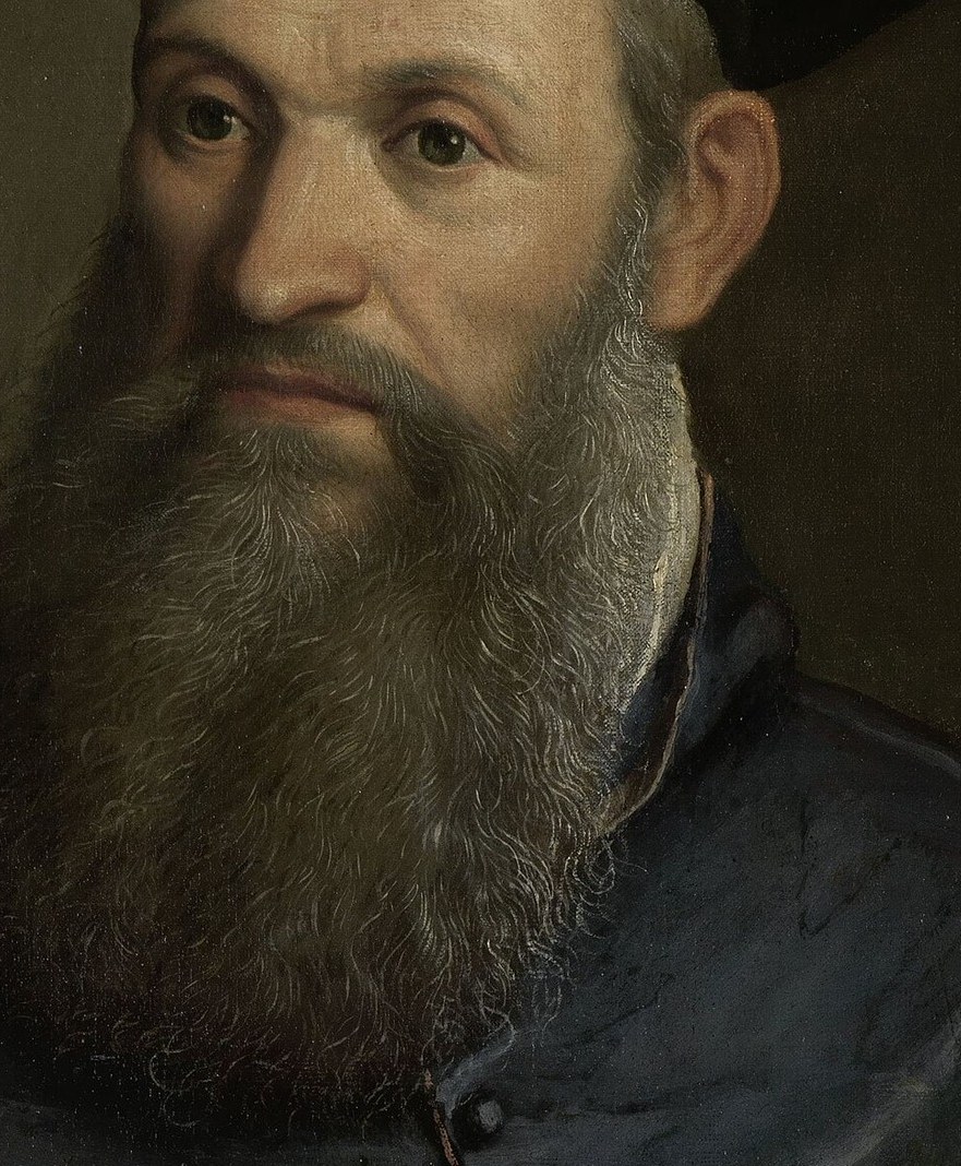 The meticulously rendered beard adds to his gravitas and suggests a mature, learned individual.