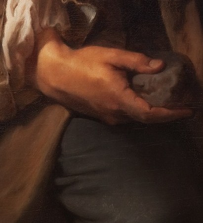See how intently he focuses on the clay in his hands.