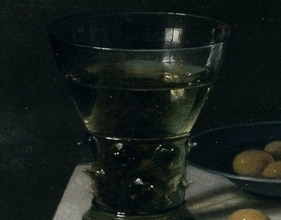 The textured glass and its contents create a strong vertical element and a sense of cool refreshment.