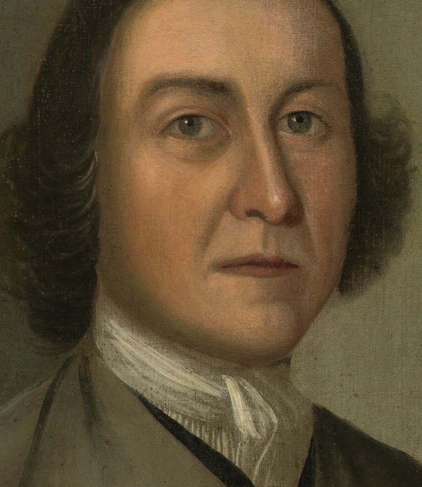 His direct gaze conveys both confidence and intelligence.