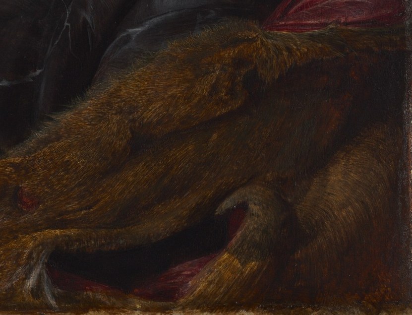 The fur stole suggests wealth and comfort.
