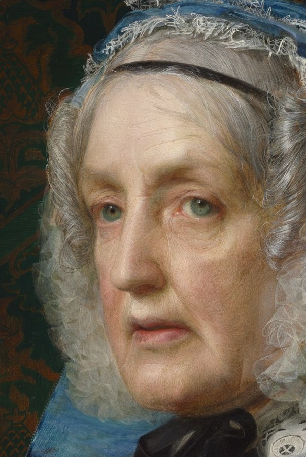 She looks out from the canvas intensely.