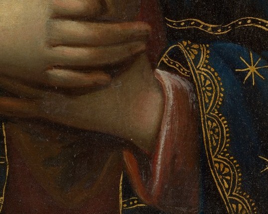 A gesture of prayer and suffering, emphasizing her piety and emotional pain.