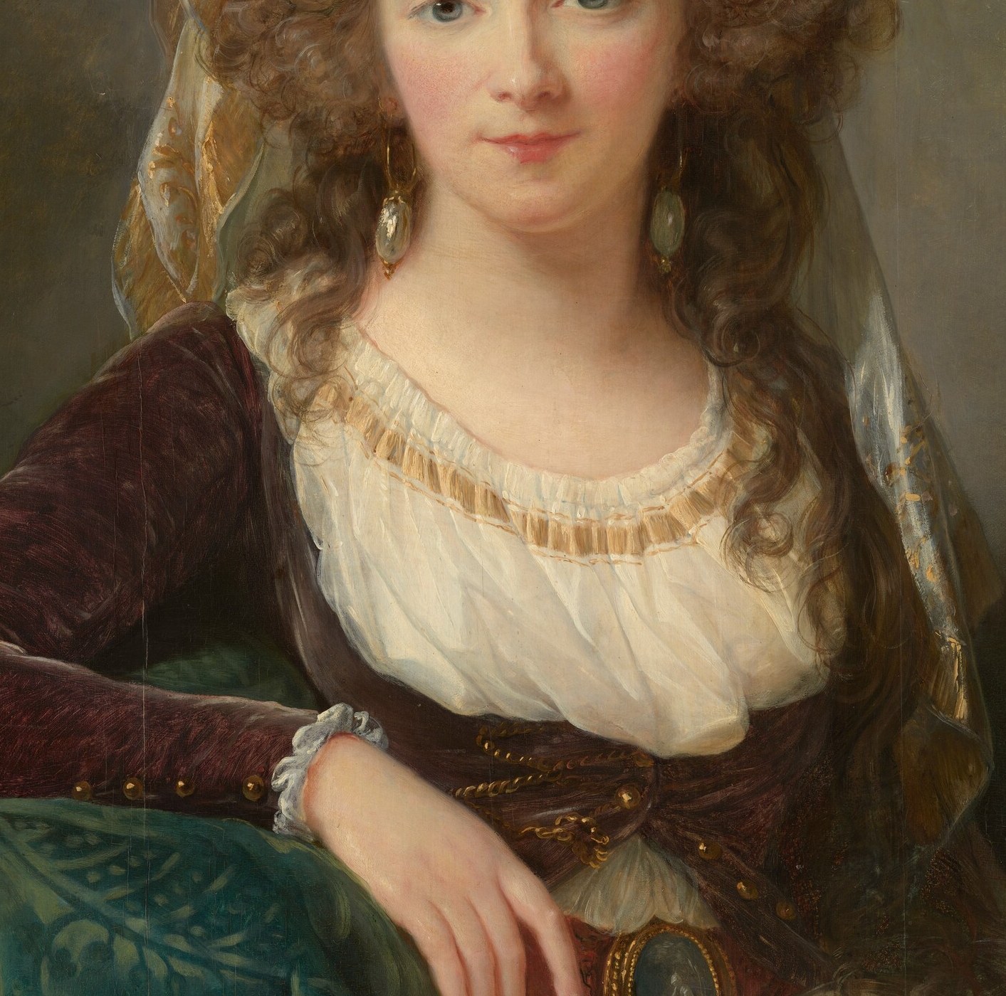 The rich wine-red velvet is painted with pronounced textural differentiation from the sheer gauze above , a virtuoso contrast passage showing Vigée Le Brun's technical mastery of fabric surfaces.