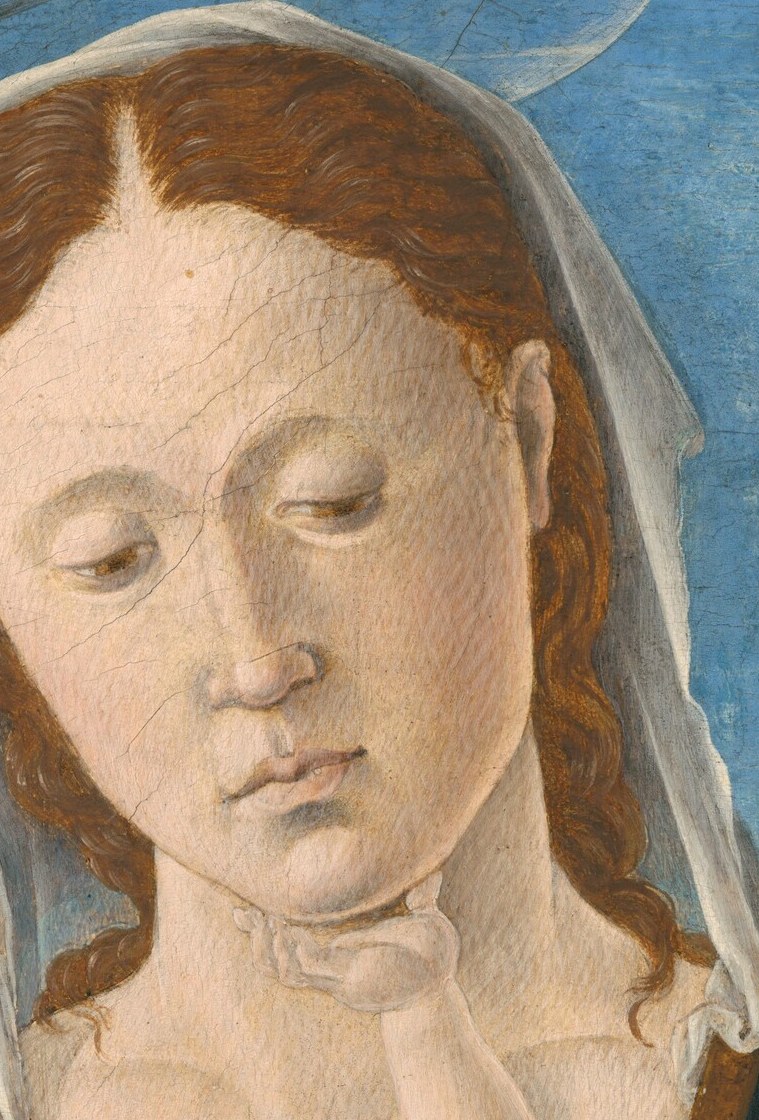 Most of the painting is an intimate, sacred scene.