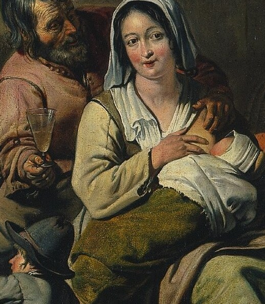 A mother cradles her infant. Look closely.
