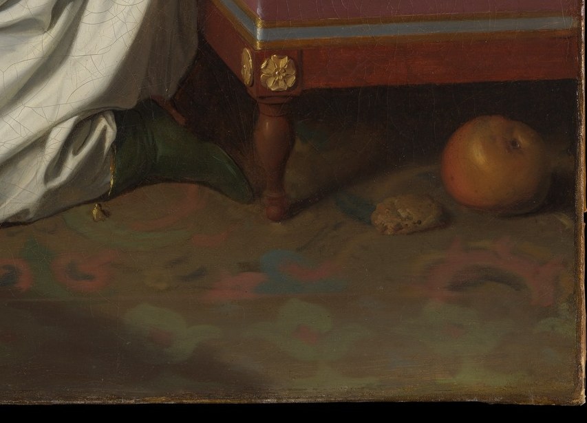 At his feet: a pretzel, scattered toys. The painter shows interrupted play.