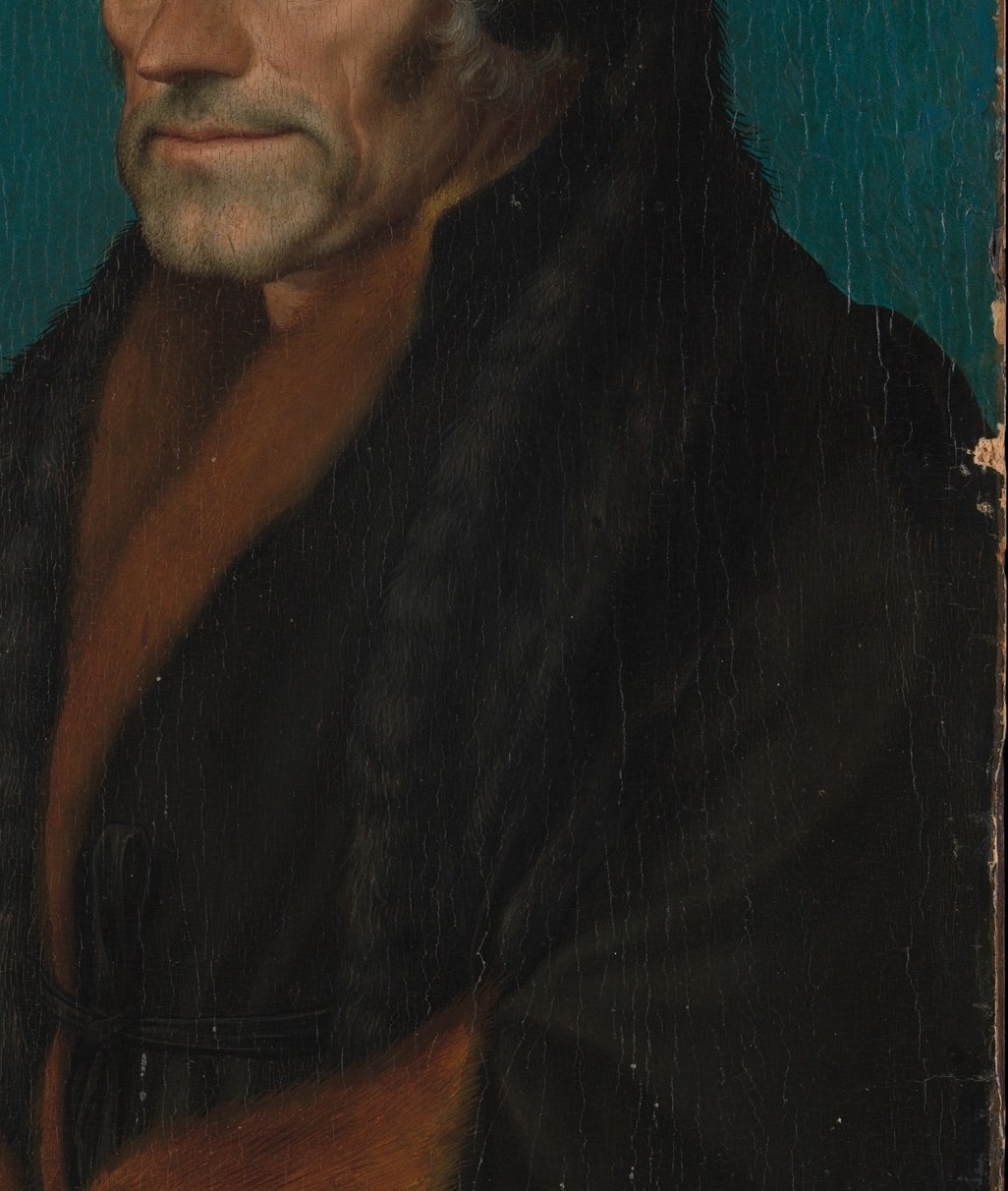 His fur robe shows his high status.