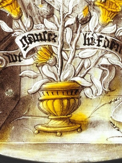 Another offers a vase of vibrant yellow flowers.