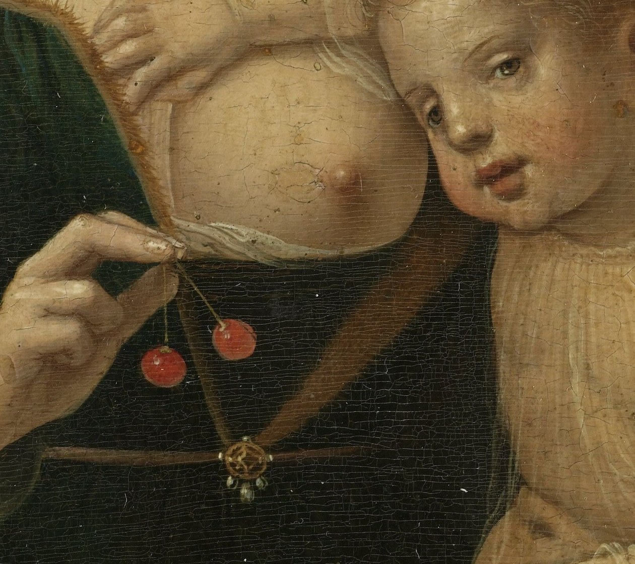 Red beads evoke coral, a traditional apotropaic charm for infants, but in a Marian context they also prefigure blood and sacrifice , the painting's most legible symbol.