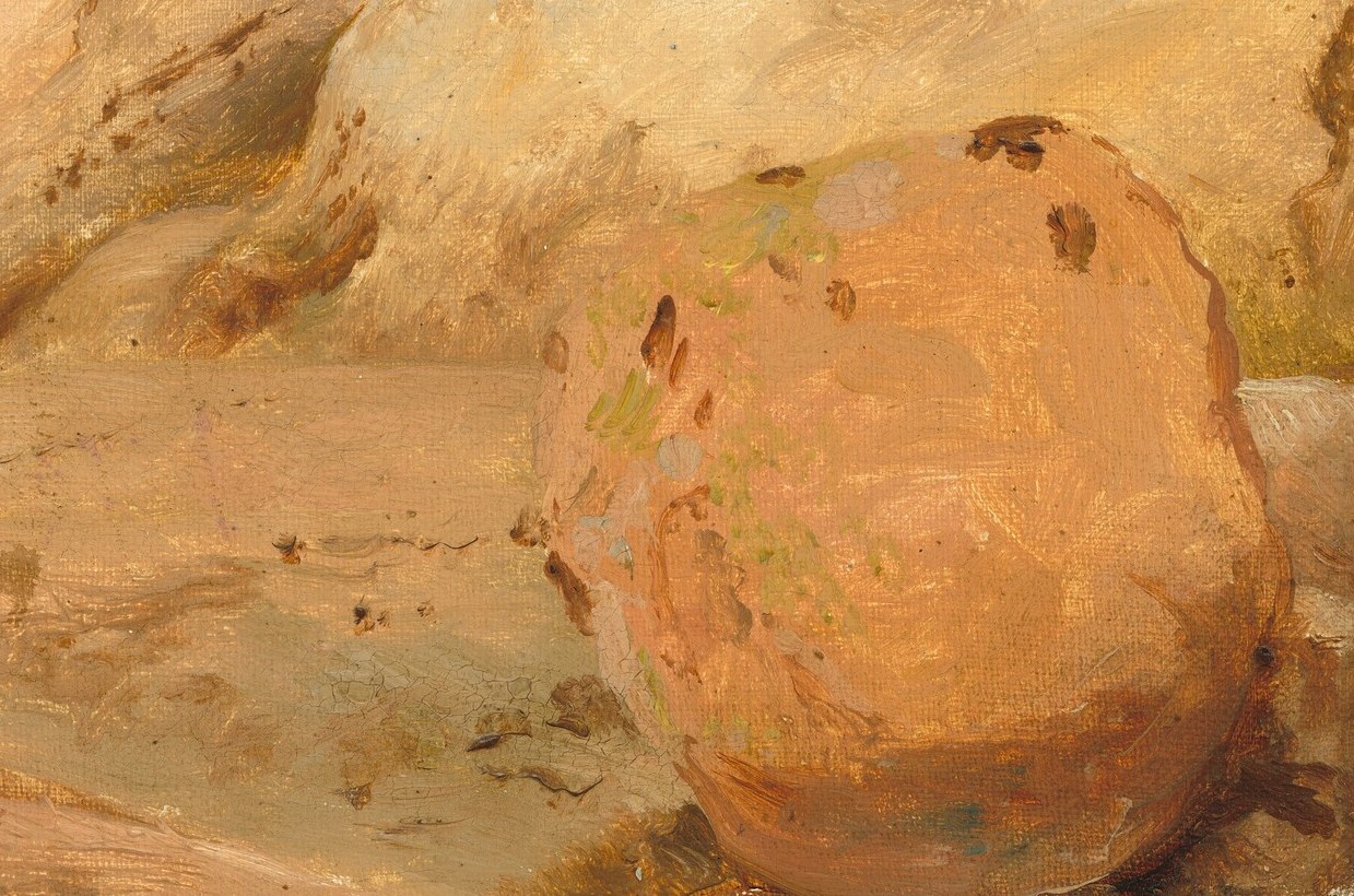 The rough texture and warm tones of the rock invite tactile exploration and emphasize the ruggedness of the terrain.