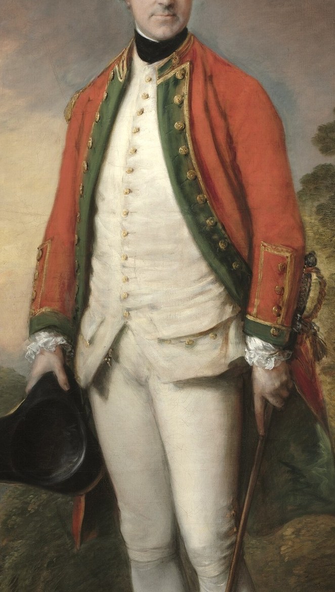 Look closely at his vibrant red coat and trim.