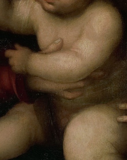 Her hand cradles the Christ Child tenderly.