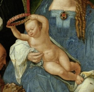 The infant's gesture is central to the narrative, conveying innocence and divine acceptance.