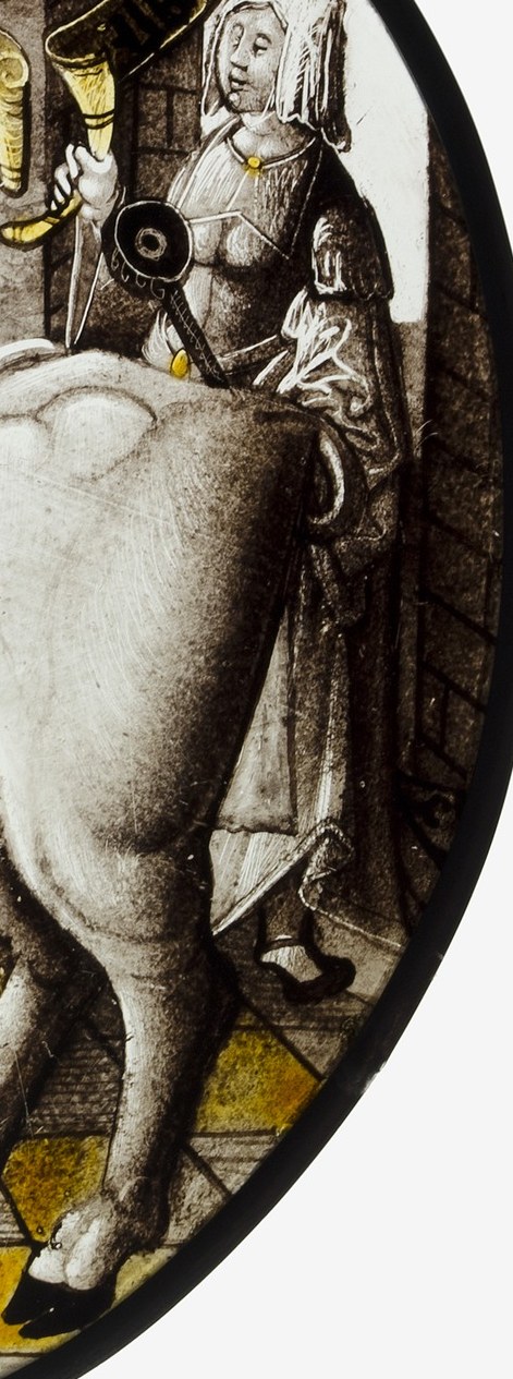 She holds a horn, perhaps to signal the ritual's start.